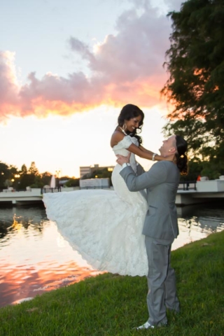 Courtyard at Lake Lucerne Wedding Groom Lifting Bride