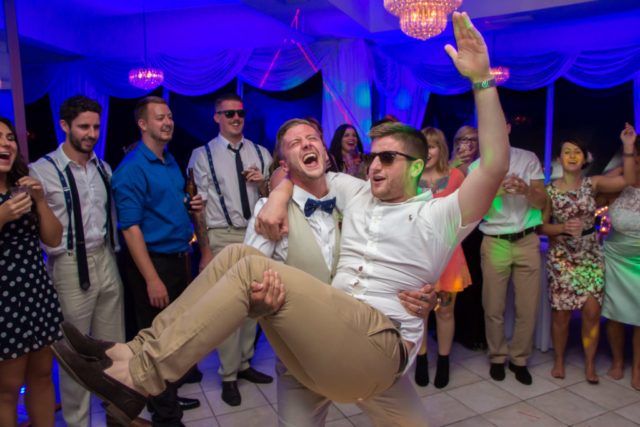 Groom Picking Up Best Man